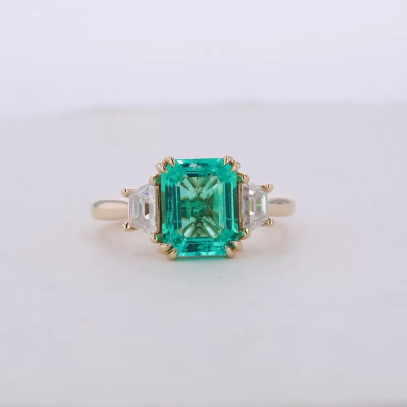 7×9mm Octagon Emerald Cut Lab Grown Emerald 9K Yellow Gold Three Stone Engagement Ring