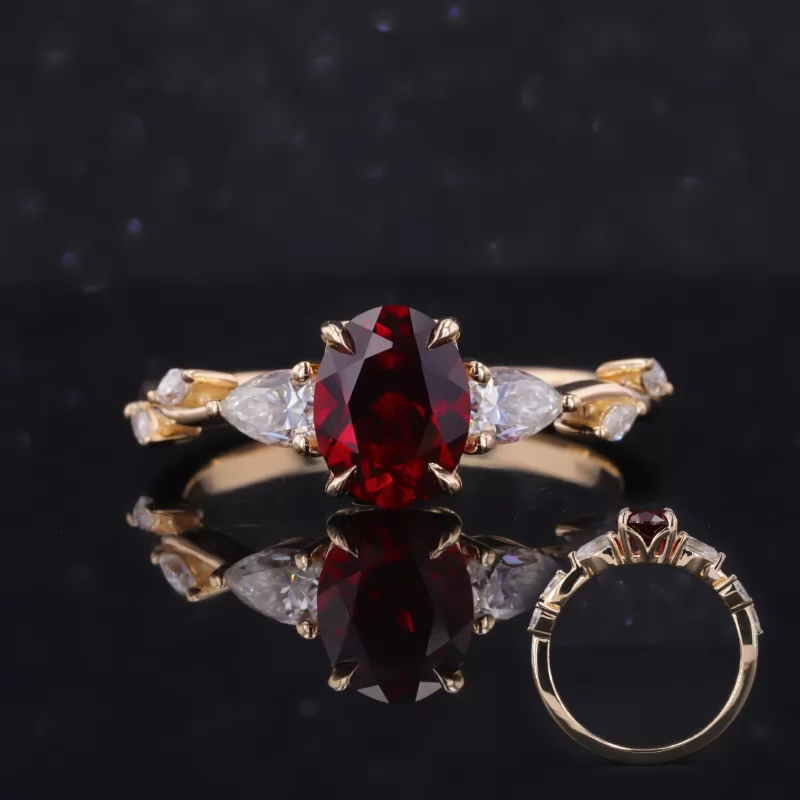 7×9mm Oval Cut Lab Grown Ruby 14K Yellow Gold Three Stone Engagement Ring