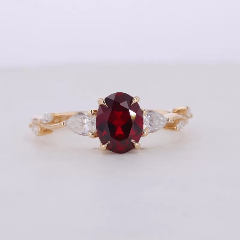 7×9mm Oval Cut Lab Grown Ruby 14K Yellow Gold Three Stone Engagement Ring