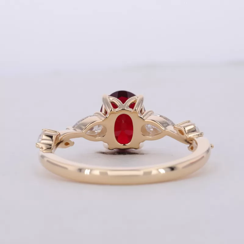 7×9mm Oval Cut Lab Grown Ruby 14K Yellow Gold Three Stone Engagement Ring