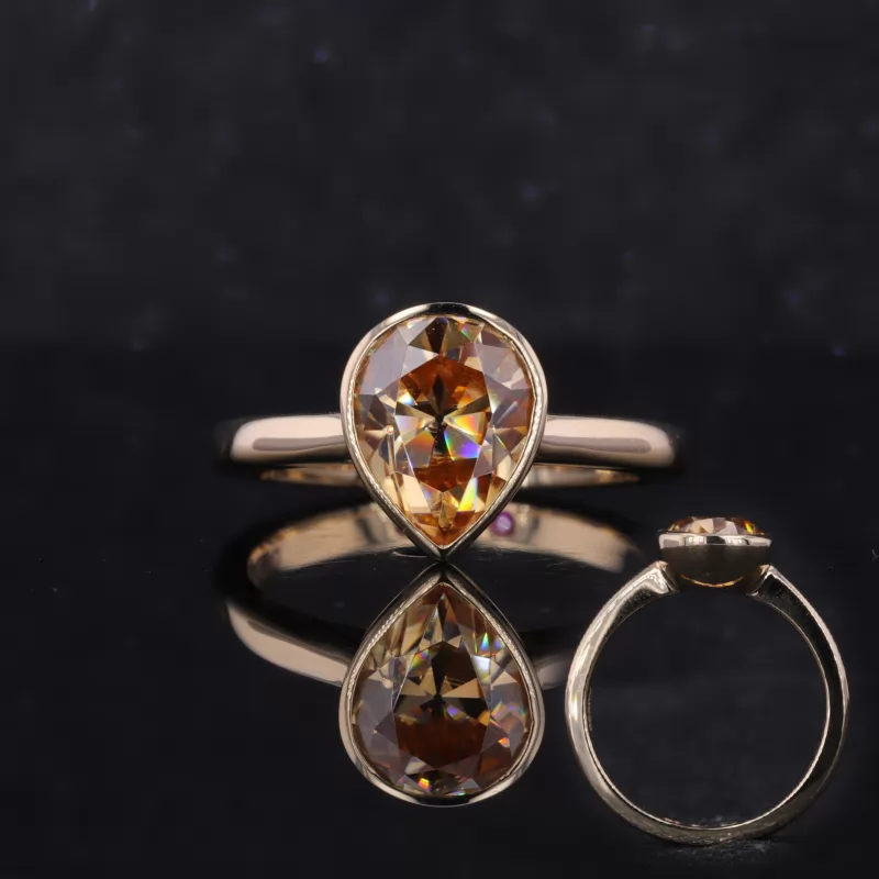 7×9mm Pear Cut Lab Grown Orange Sapphire Bezel Set 14K Yellow Gold Solitaire Engagement Ring