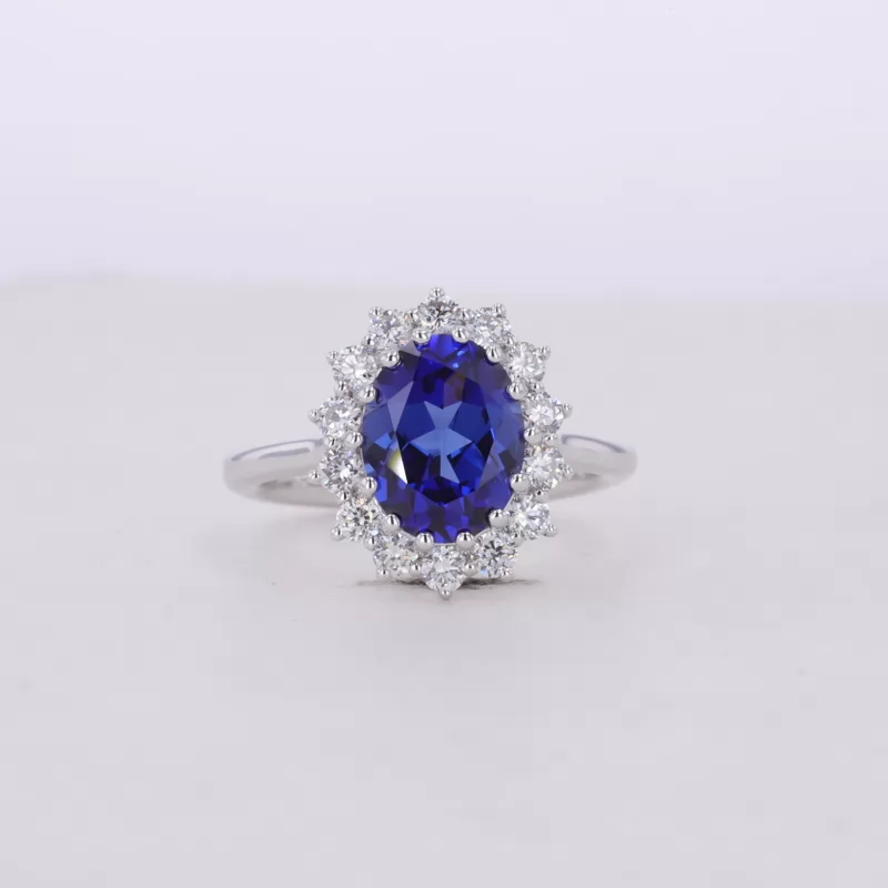 7×9mm Oval Cut Lab Grown Sapphire 18K White Gold Halo Engagement Ring