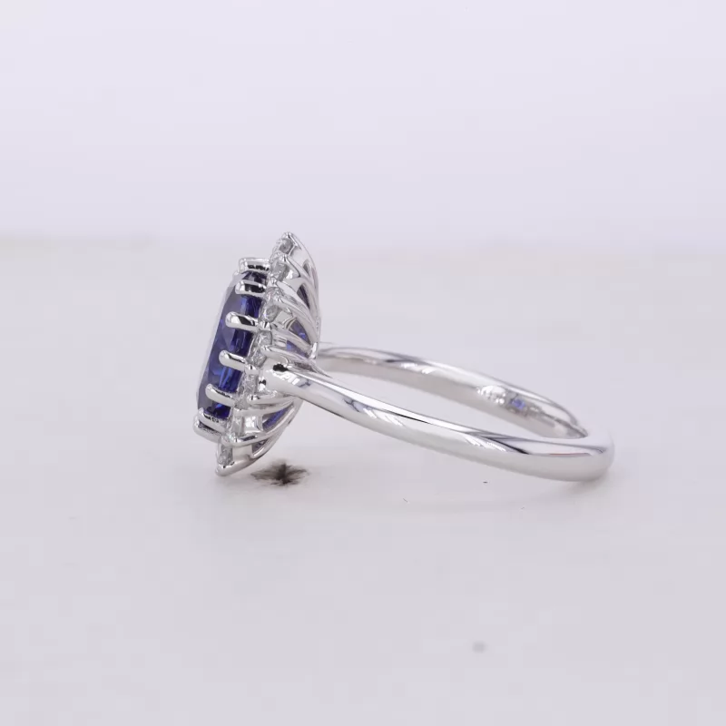 7×9mm Oval Cut Lab Grown Sapphire 18K White Gold Halo Engagement Ring