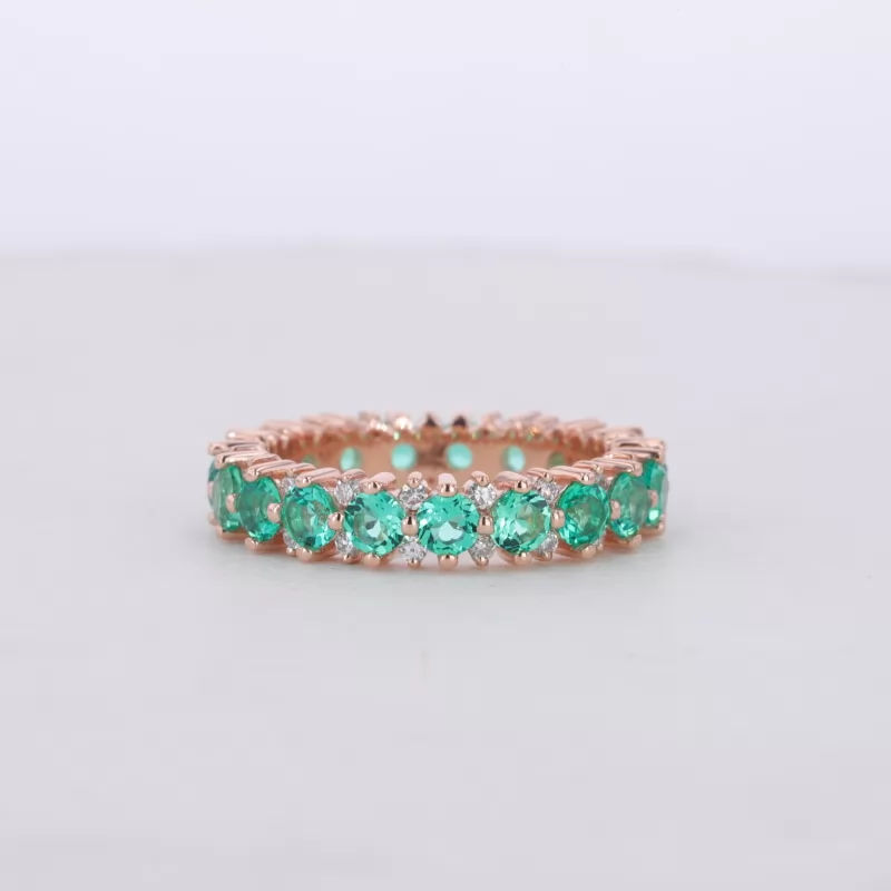 2.9mm Round Brilliant Cut Lab Grown Emerald & 1.5mm Round Brilliant Cut Moissanite 14K Rose Gold Diamond Eternity Ring