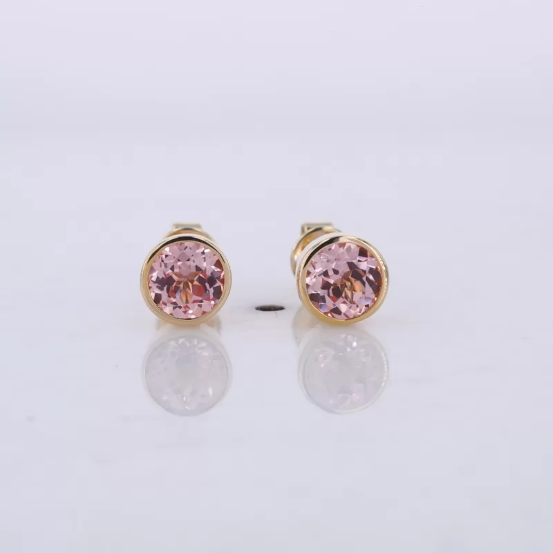 5mm Round Brilliant Cut Lab Grown Padparadscha Pink Sapphire Bezel Set 10K Yellow Gold Diamond Stud Earrings