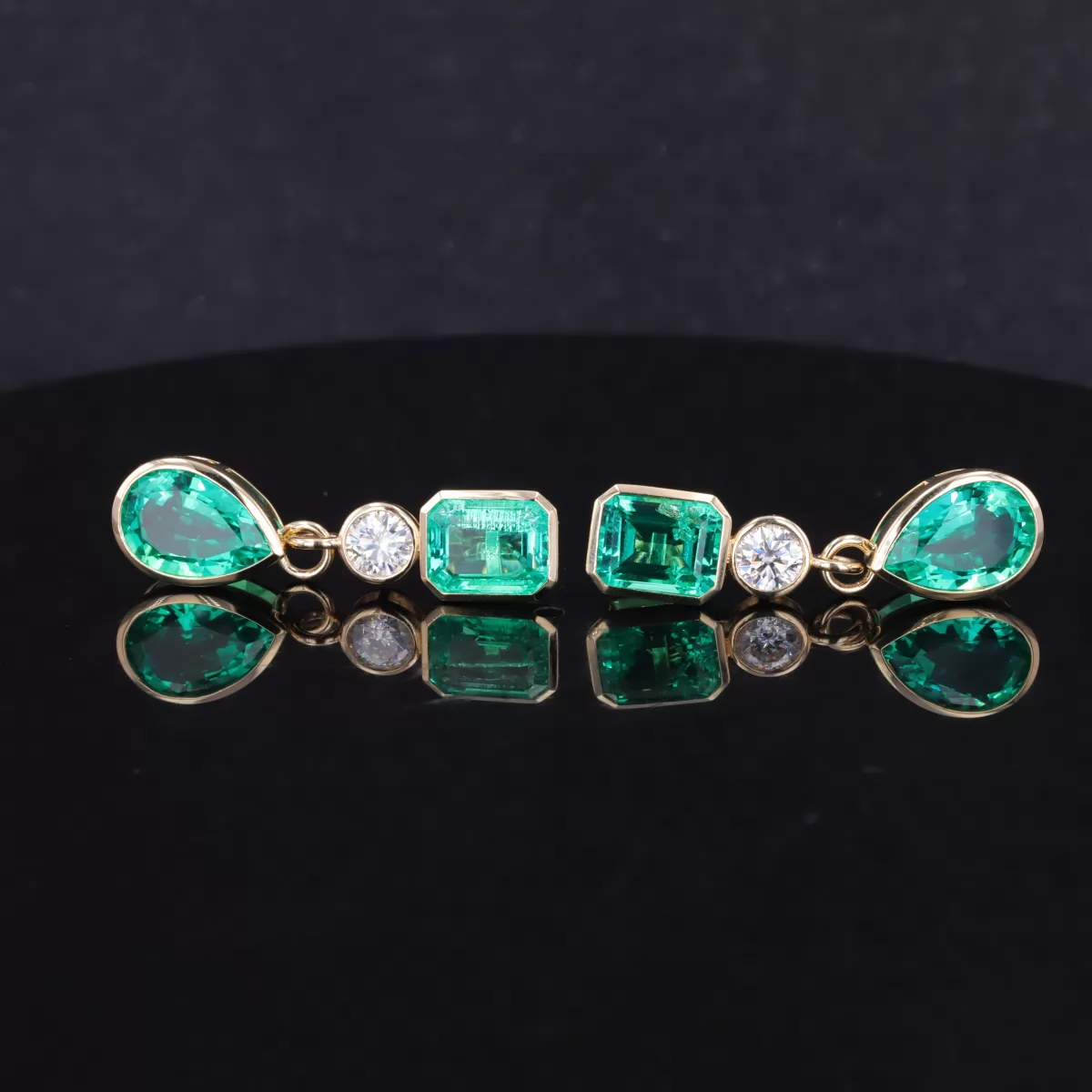 8×12mm Pear Cut Lab Grown Emerald & 7×9mm Octagon Emerald Cut Lab Grown Emerald & 5mm Round Brilliant Cut Moissanite Bezel Set 10K Yellow Gold Drop Dangle Diamond Earrings