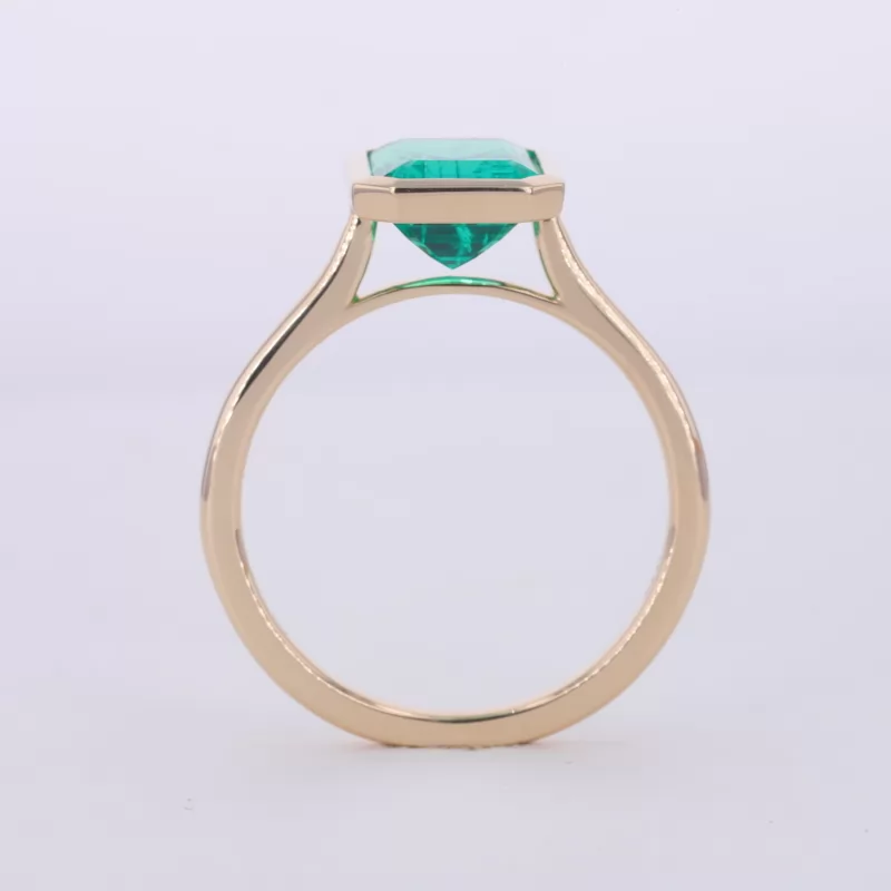 7×9mm Octagon Emerald Cut Lab Grown Emerald Bezel Set 14K Yellow Gold Solitaire Engagement Ring
