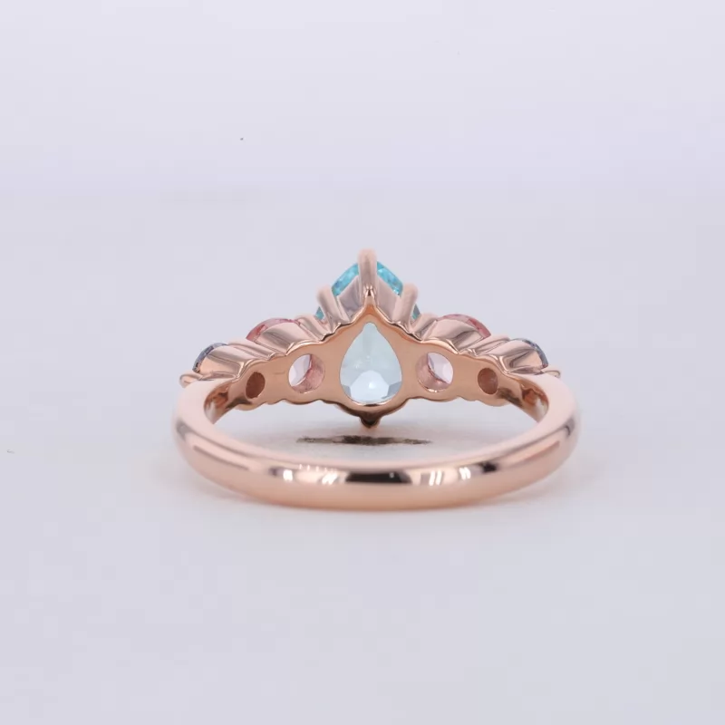 6×8mm Pear Cut Lab Grown Paraiba Sapphire With Side Moissanite 10K Rose Gold Engagement Ring