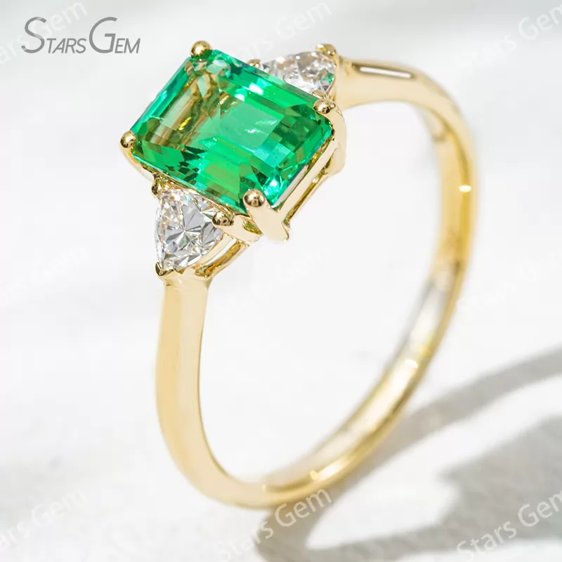 6×8mm Octagon Emerald Cut Lab Grown Emerald 18K Gold Three Stone Engagement Ring