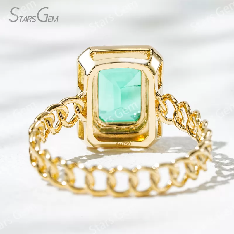 6×8mm Octagon Emerald Cut Lab Grown Emerald 18K Yellow Gold Halo Engagement Ring