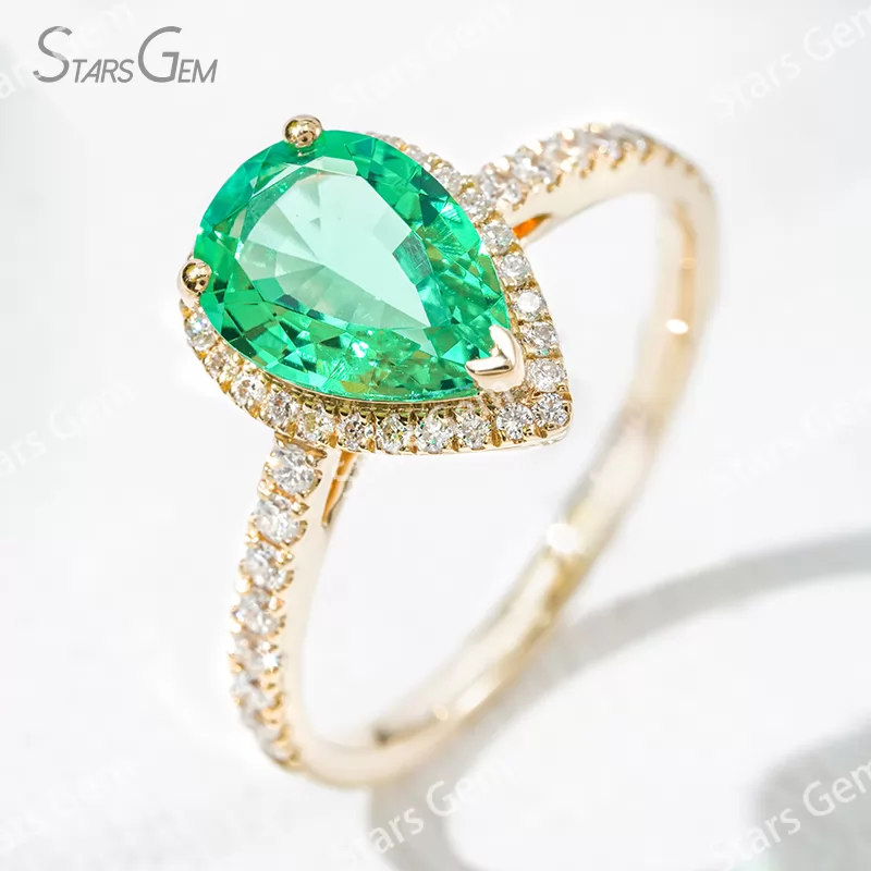 7×10​mm Pear Cut Lab Grown Emerald 18K Yellow Gold Halo Engagement Ring
