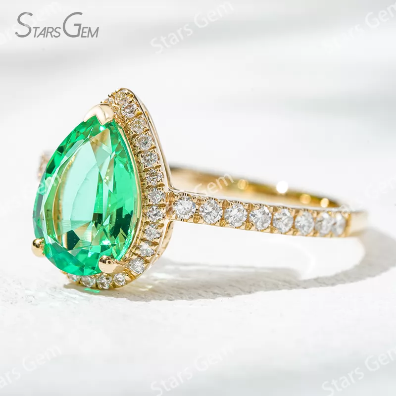 7×10​mm Pear Cut Lab Grown Emerald 18K Yellow Gold Halo Engagement Ring