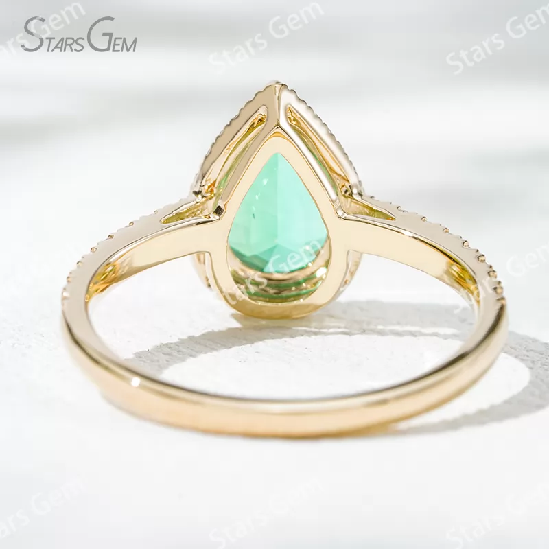 7×10​mm Pear Cut Lab Grown Emerald 18K Yellow Gold Halo Engagement Ring